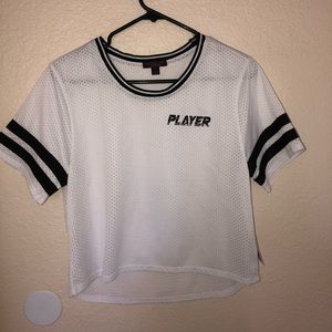 white and black player tee